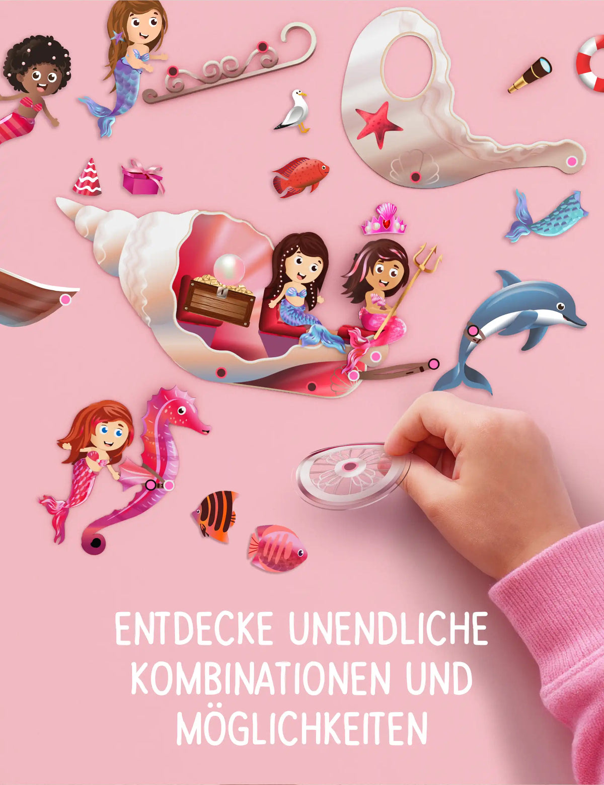 Kinderhand baut eine Muschel-Kutsche mit Meerjungfrauen aus wiederverwendbaren klebo Stickern